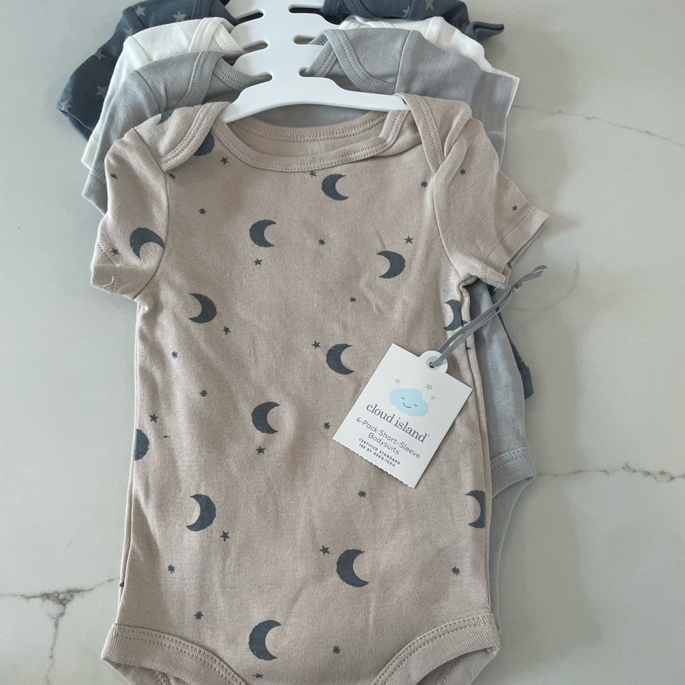 Cloud Island Baby Onesies - set of 4